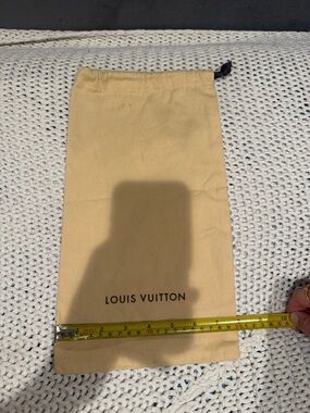 Louis Vuitton Beige Drawstring Pouch with Black Logo